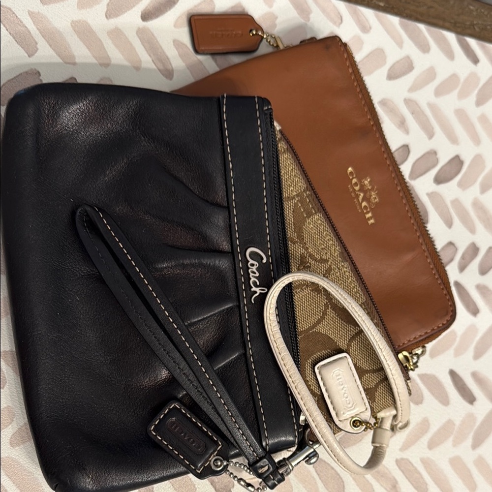 Coach Black and Brown Leather Clutches